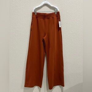 Cute burnt orange, wide leg pants - Girls size 10 to 12.